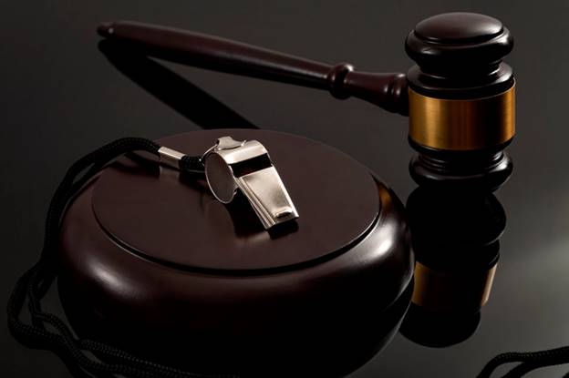 Whistle next to gavel - Whistleblower Protection